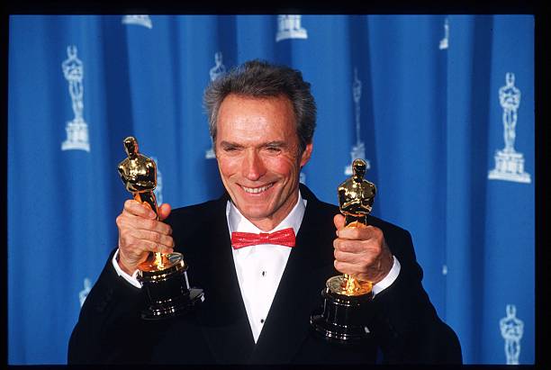 https://media.gettyimages.com/photos/actor-clint-eastwood-stands-with-his-oscars-at-the-academy-awards-29-picture-id798580?k=20&m=798580&s=612x612&w=0&h=uExSSfaFeiR8pqKHGa7FVLfFYmy7E0sAEEWvpnZxxWA=